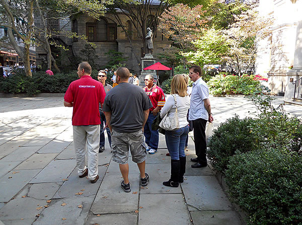 tour group pausing at Boston's Old City Hall